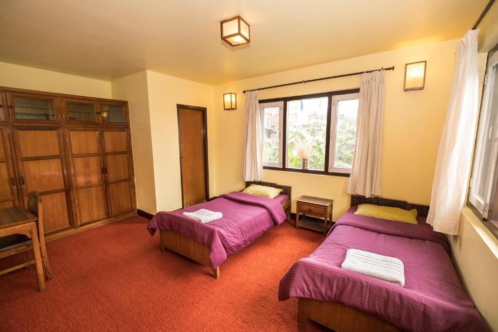 Letto o letti in una camera di Swayambhu View Guest House