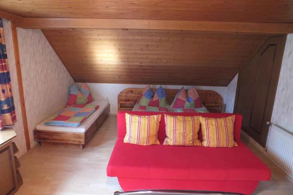 A bed or beds in a room at Eggerhof