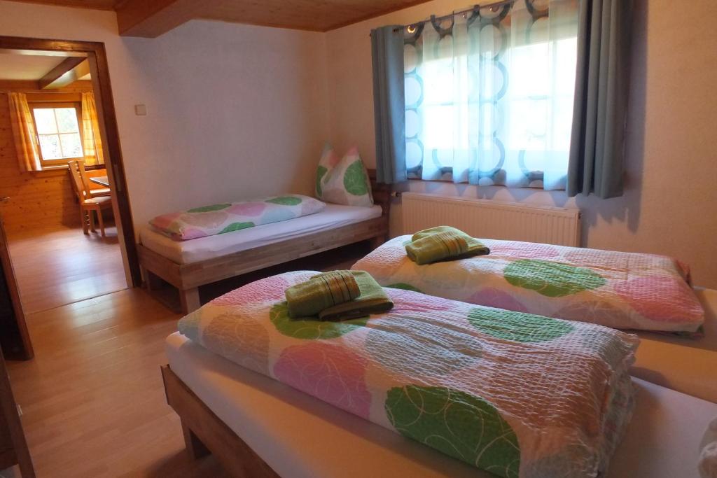 A bed or beds in a room at Eggerhof