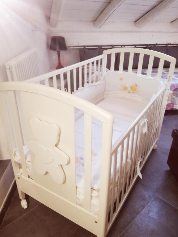 Postel nebo postele na pokoji v ubytování B&B Il Tetto di Anita