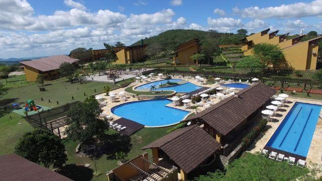 an aerial view of a resort with two swimming pools at Winterville Gravata in Gravatá