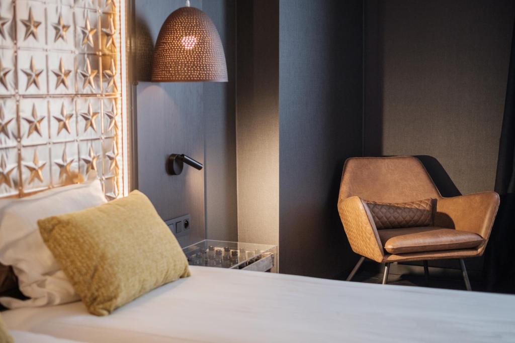 Postel nebo postele na pokoji v ubytování Hotel Brouwerij Het Anker