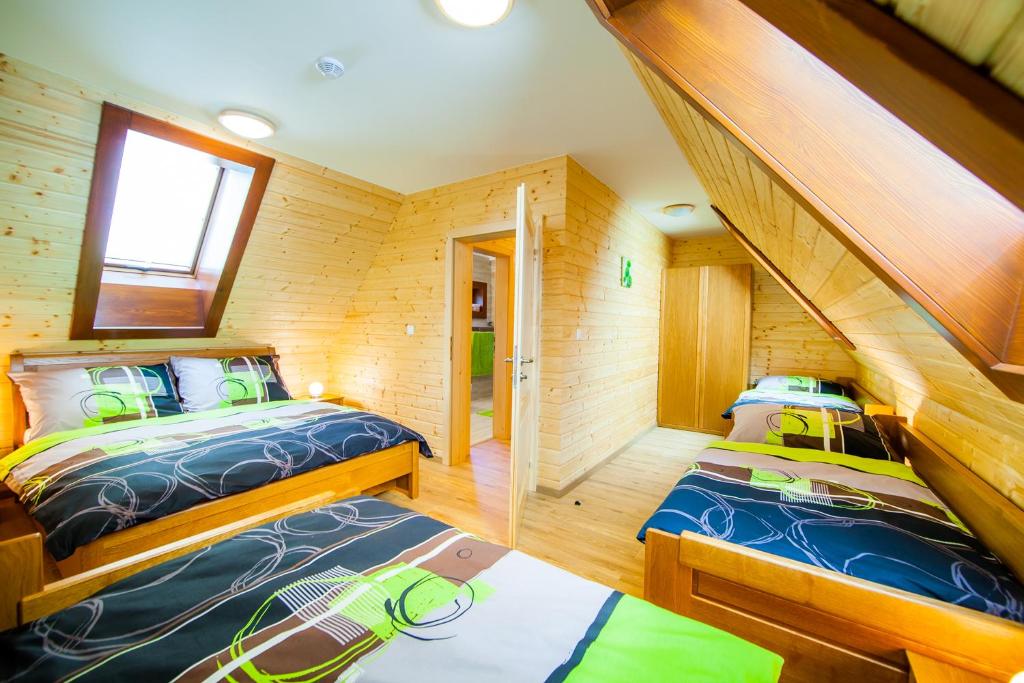 Postel nebo postele na pokoji v ubytování Relax Apartmany