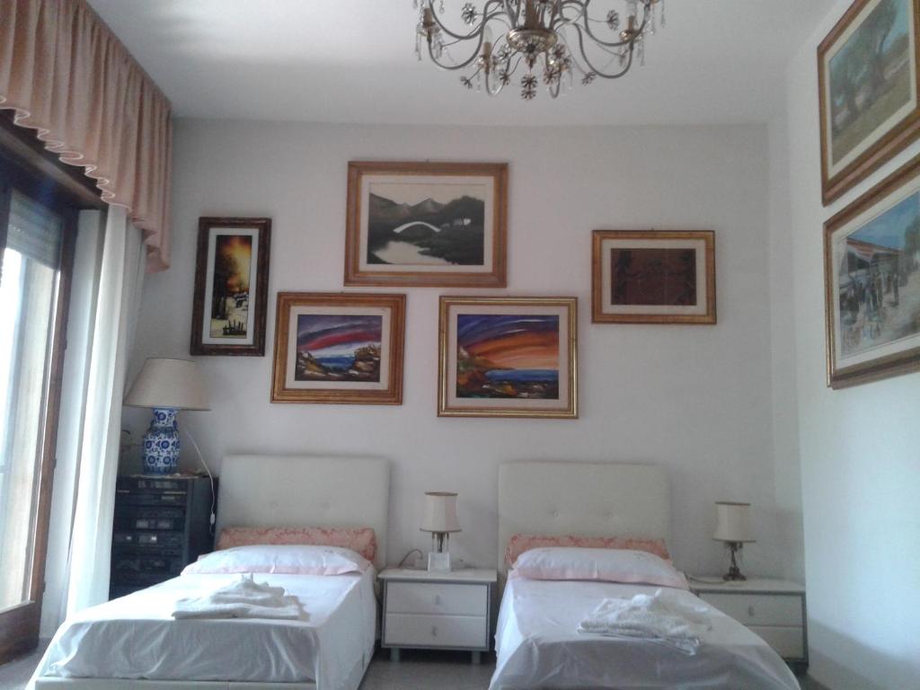 Postel nebo postele na pokoji v ubytování B&B Tra i mari del Salento