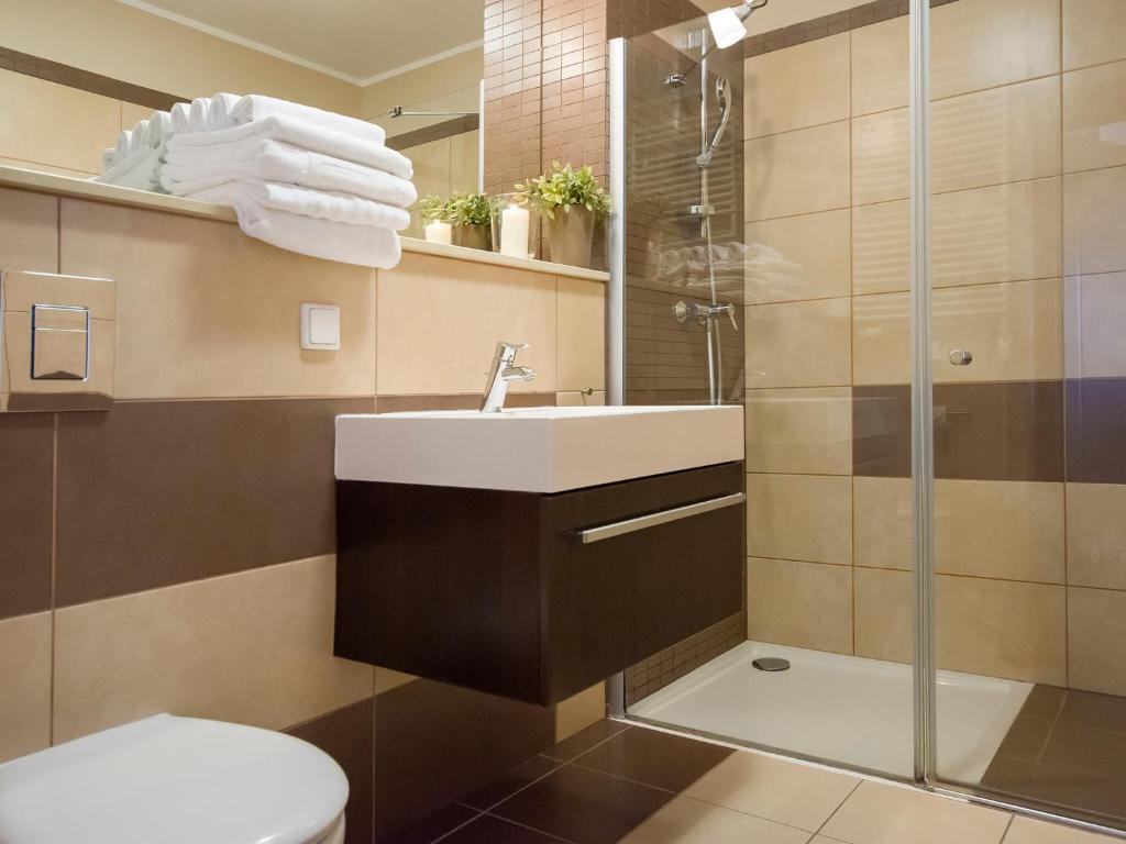 Kúpeľňa v ubytovaní VacationClub - Olympic Park Apartment 404
