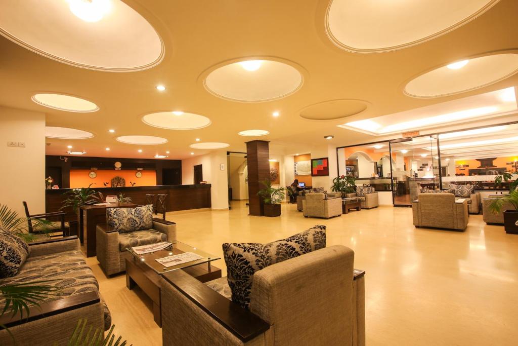 Ruang duduk di Waterfront Resort by KGH Group
