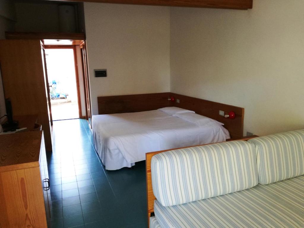 Posteľ alebo postele v izbe v ubytovaní Hotel Kyrie Isole Tremiti
