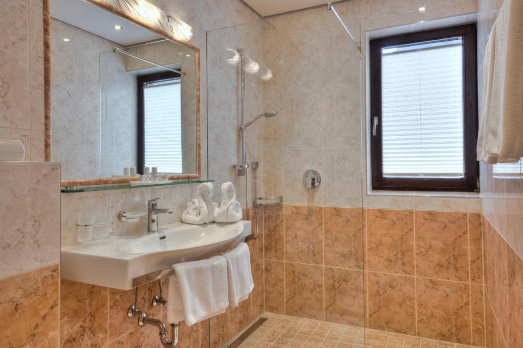 Koupelna v ubytování Bergsporthotel Antonie