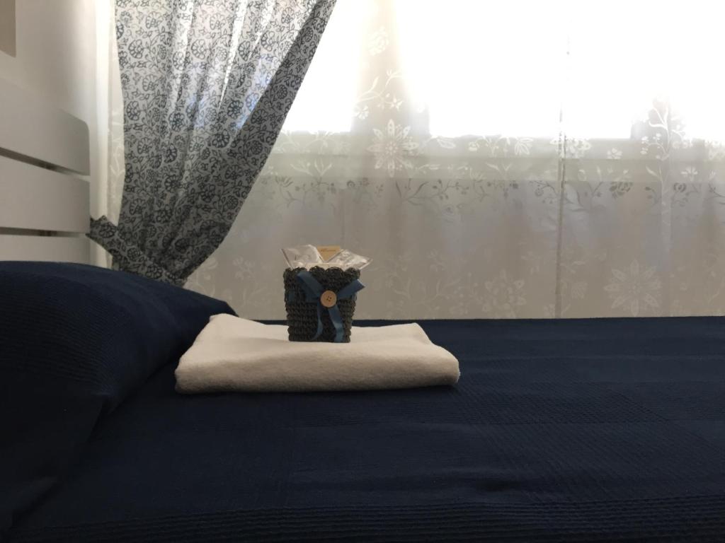 A bed or beds in a room at Aquarius Rome