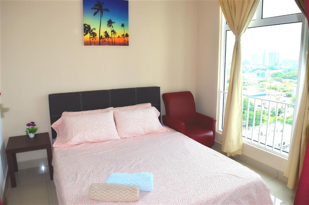 מיטה או מיטות בחדר ב-888@D'Perdana Sri Cemerlang