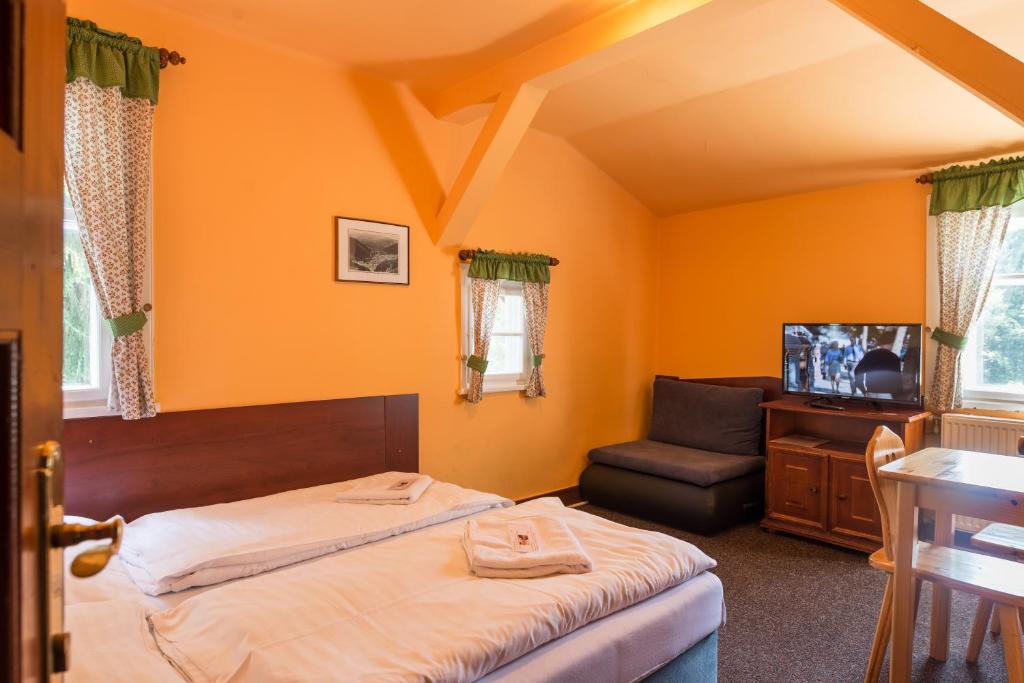 Postel nebo postele na pokoji v ubytování Hotel Diana