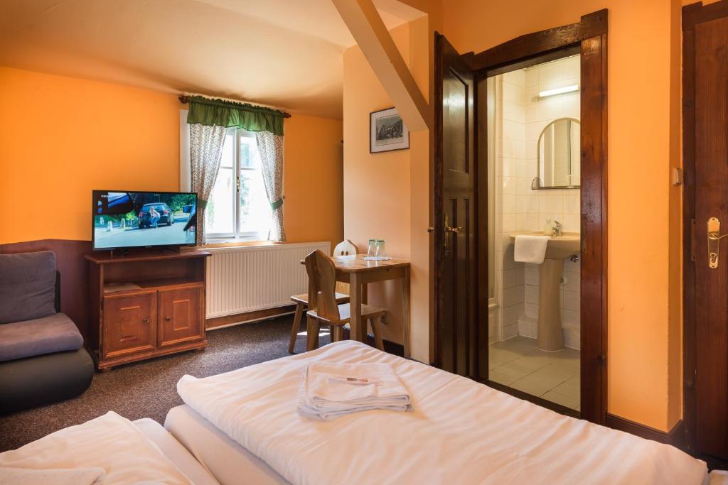 Postel nebo postele na pokoji v ubytování Hotel Diana