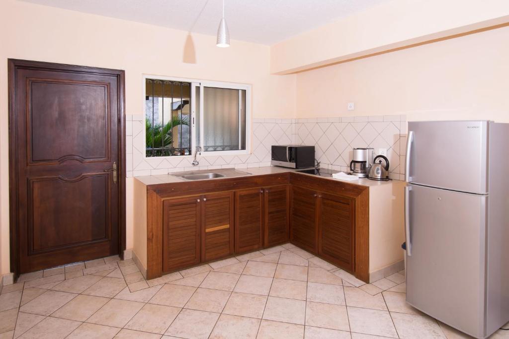Kuchyň nebo kuchyňský kout v ubytování Residence Peramal