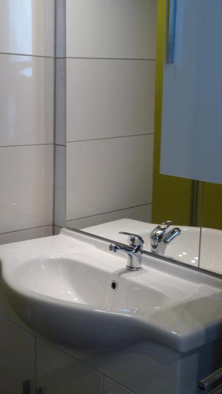 Koupelna v ubytování Hotel Rodizio UG