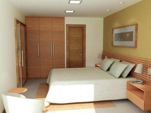 Een bed of bedden in een kamer bij Residence Kariri Beach Cumbuco