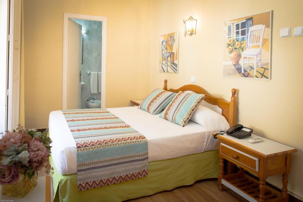 Кровать или кровати в номере Bed & Breakfast Naranjo
