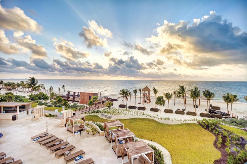 an aerial view of the beach at the resort at Hideaway at Royalton Riviera Cancun, An Autograph Collection All- Inclusive Resort - Adults Only in Puerto Morelos