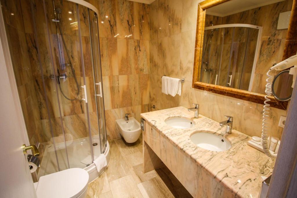 Koupelna v ubytování Grand Hotel Palladium