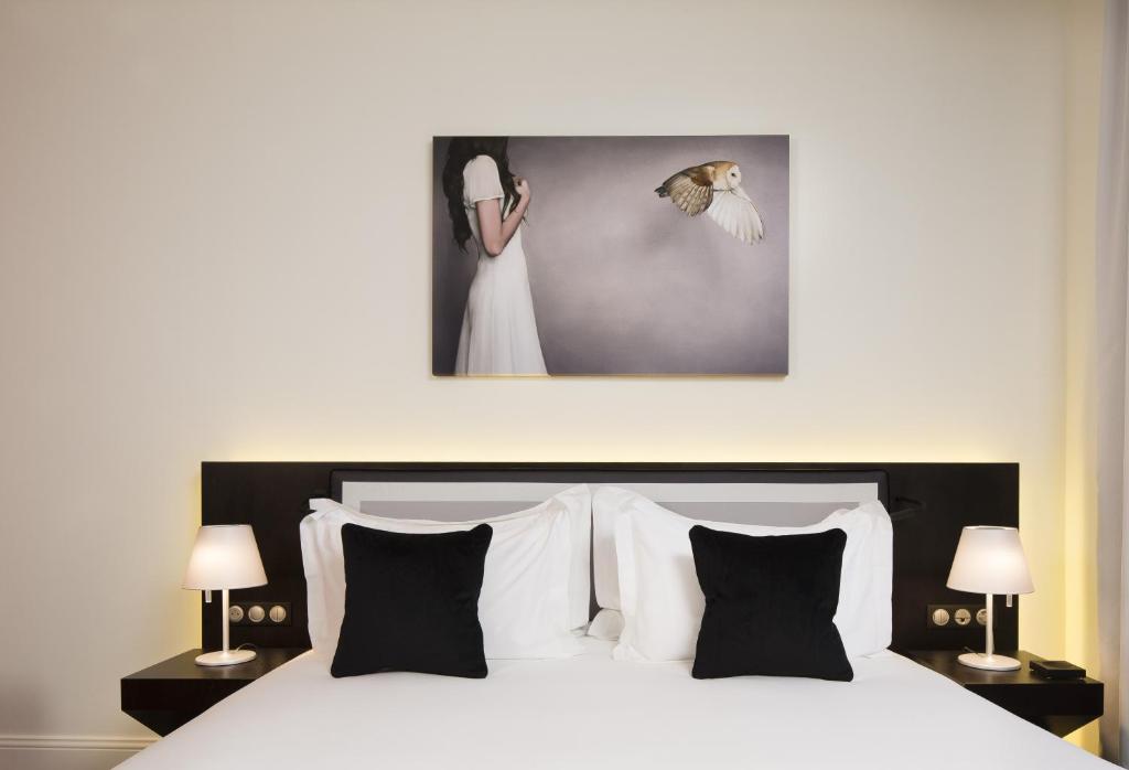 Postel nebo postele na pokoji v ubytování Boutique Hotel Des XV