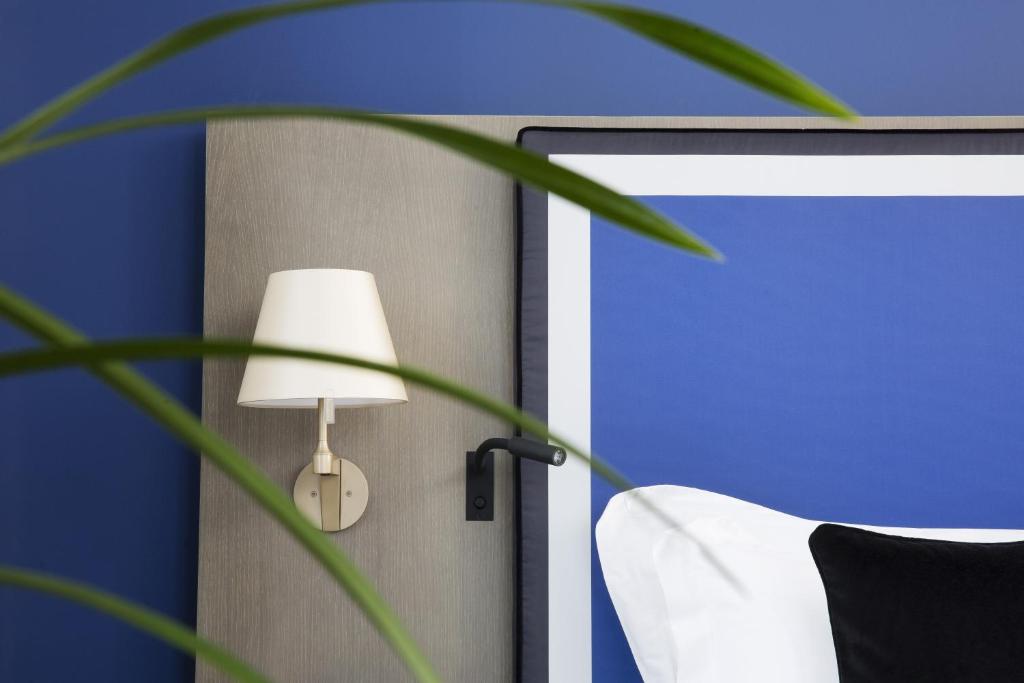 Postel nebo postele na pokoji v ubytování Boutique Hotel Des XV