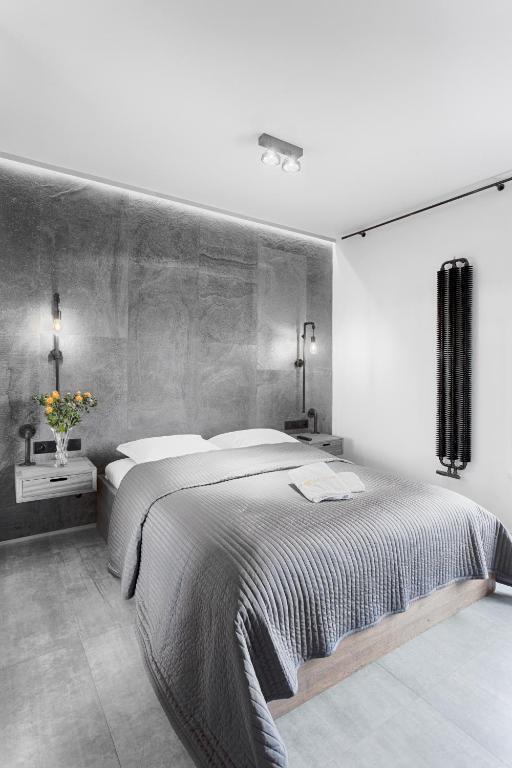 Posteľ alebo postele v izbe v ubytovaní Qbik Loft Aparts
