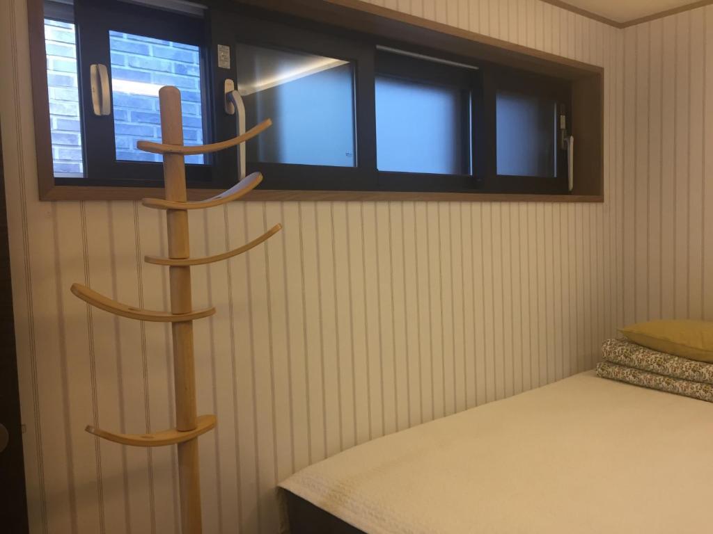 Postel nebo postele na pokoji v ubytování Guest House Dalggume