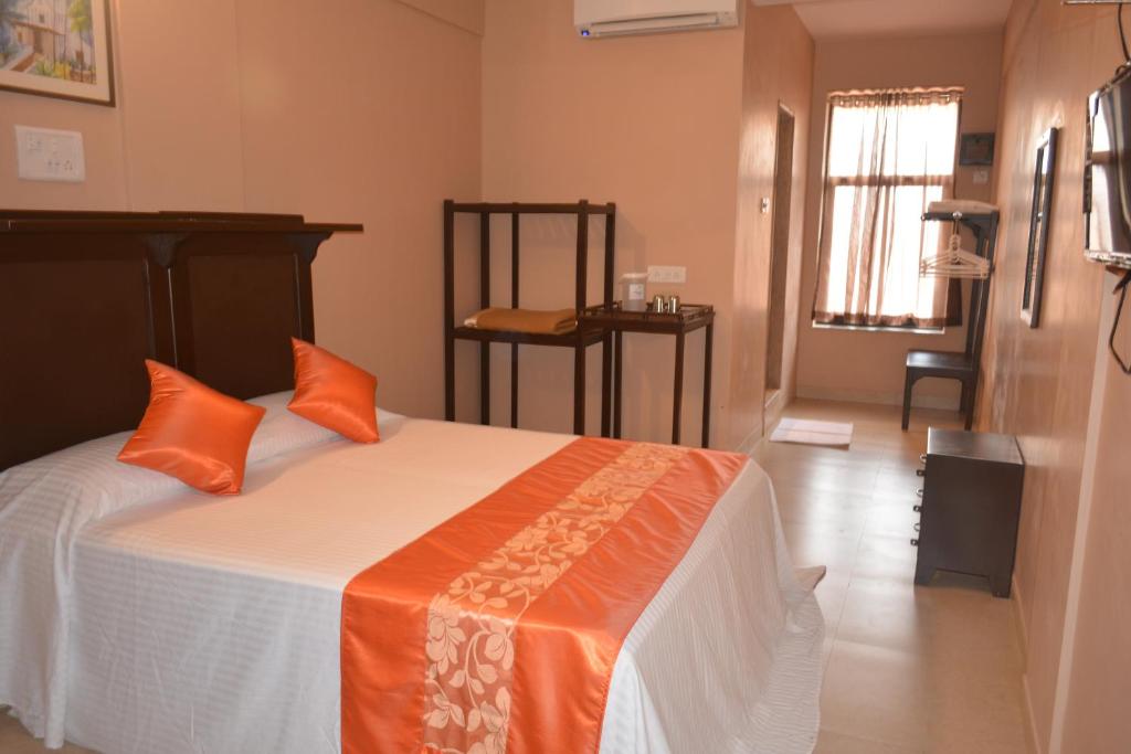 Postel nebo postele na pokoji v ubytování Dimar Beach Hotel