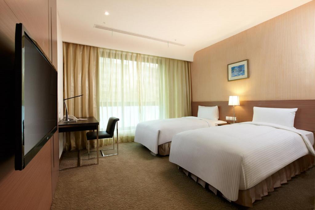 TV a/nebo společenská místnost v ubytování Taisugar Hotel Taipei