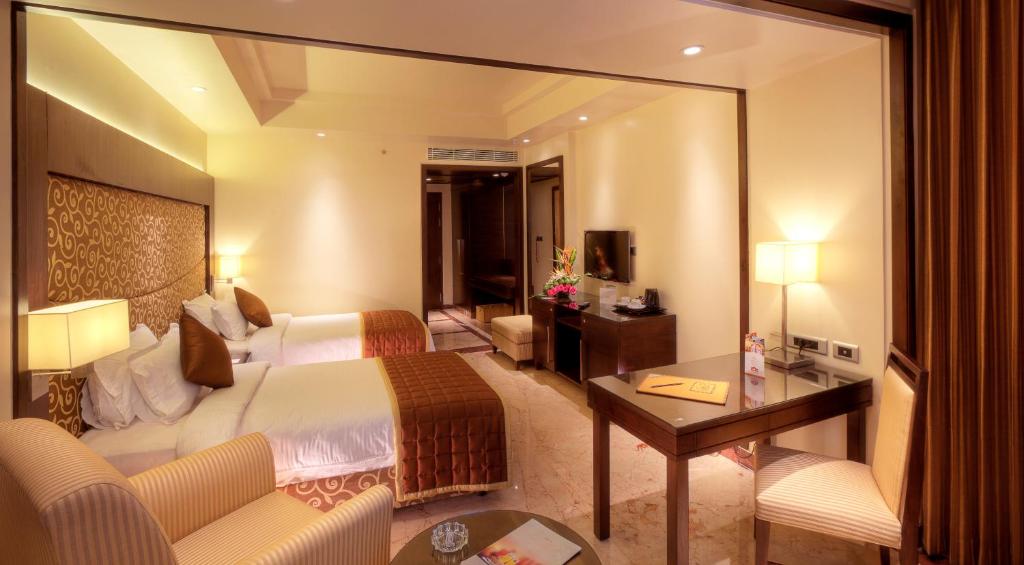 Posezení v ubytování Anandha Inn Convention Centre and Suites