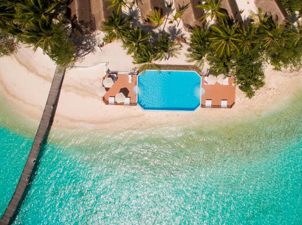 an aerial view of a resort on a tropical island at Thulhagiri Island Resort & Spa in North Male Atoll