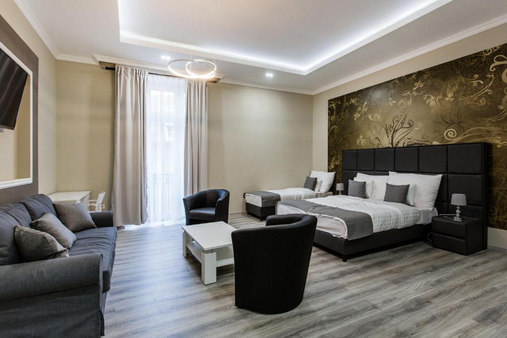 Posezení v ubytování A Golden Star Modern Luxury Apartments and Rooms Budapest