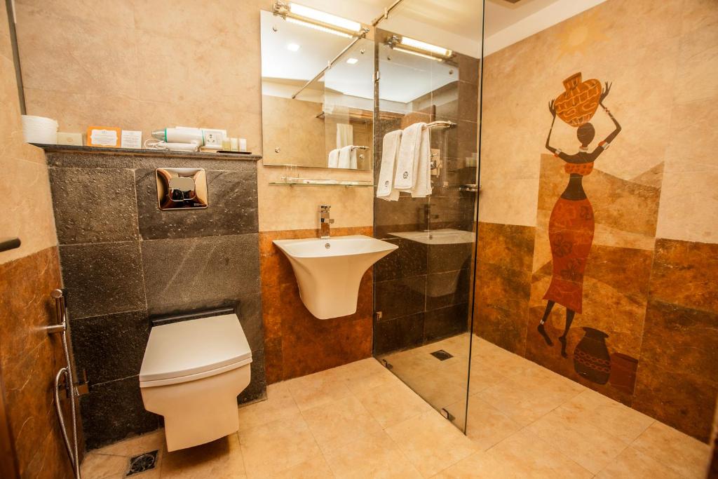 Koupelna v ubytování Traditional Comfort Boutique Hotel