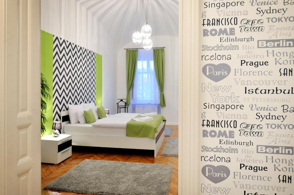 Posteľ alebo postele v izbe v ubytovaní Várkapitány Apartman Eger