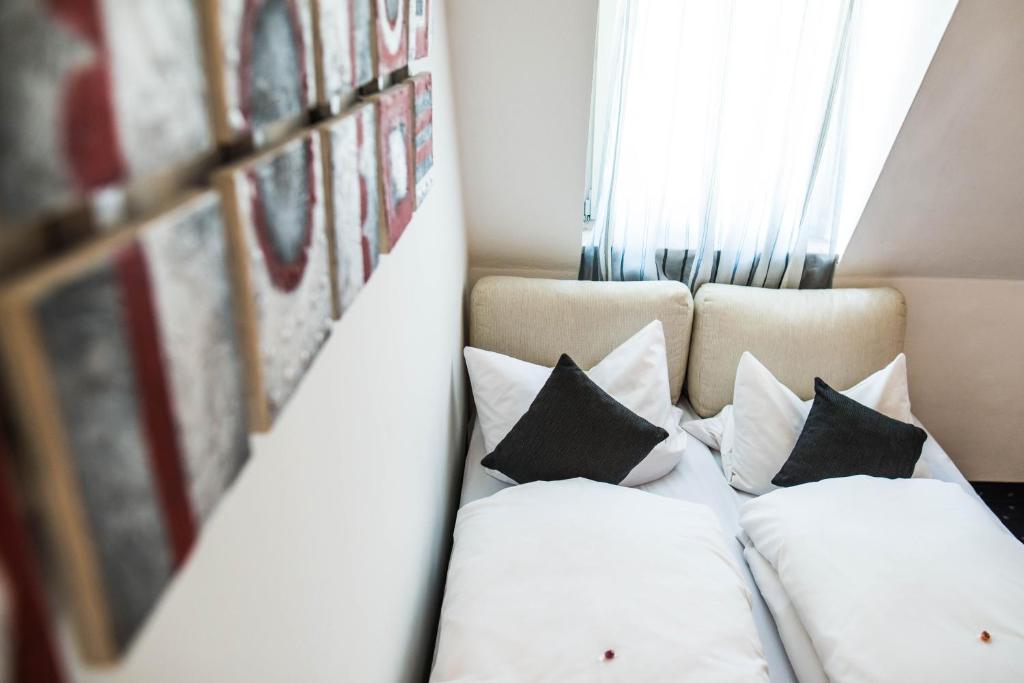 Postel nebo postele na pokoji v ubytování Hotel Domizil