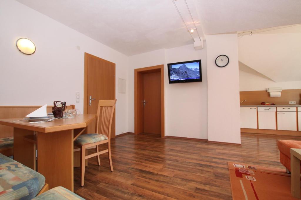 Kuchyň nebo kuchyňský kout v ubytování Apart Rustica