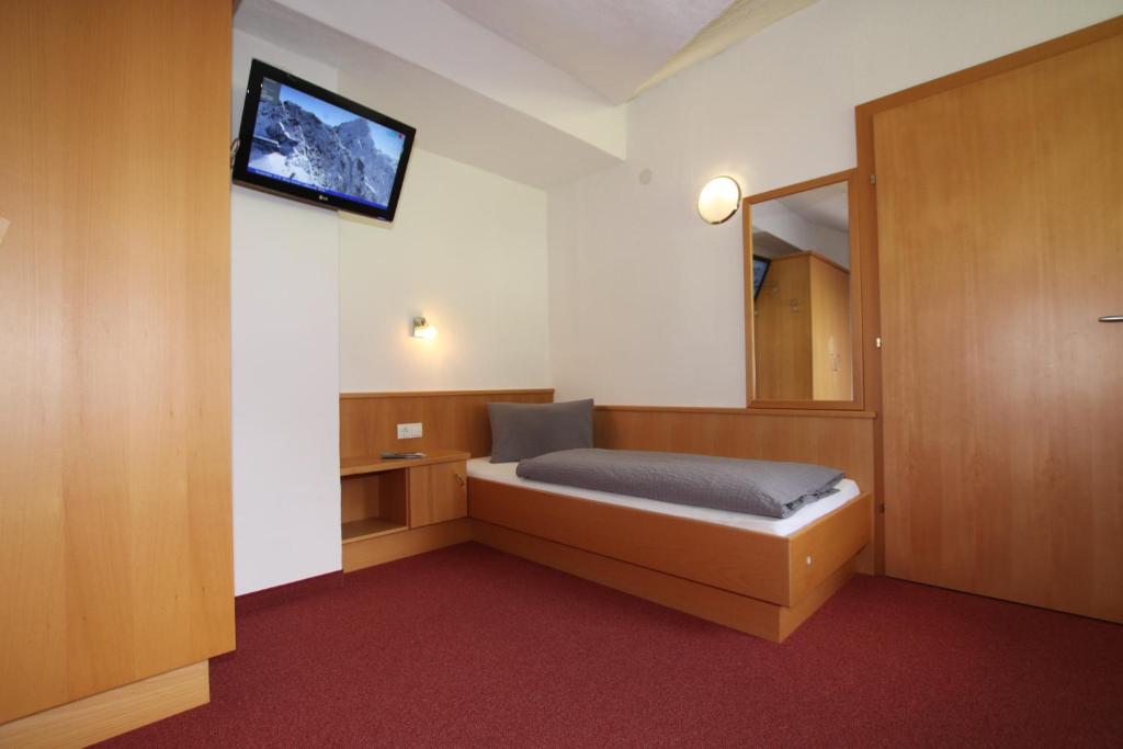 Postel nebo postele na pokoji v ubytování Apart Rustica