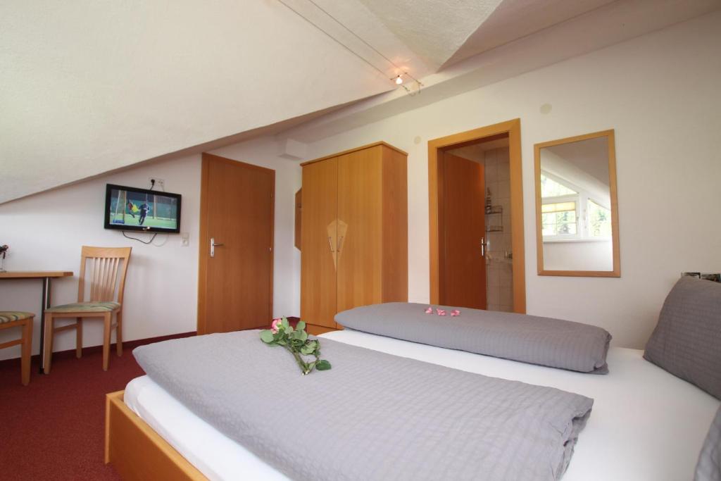 Postel nebo postele na pokoji v ubytování Apart Rustica