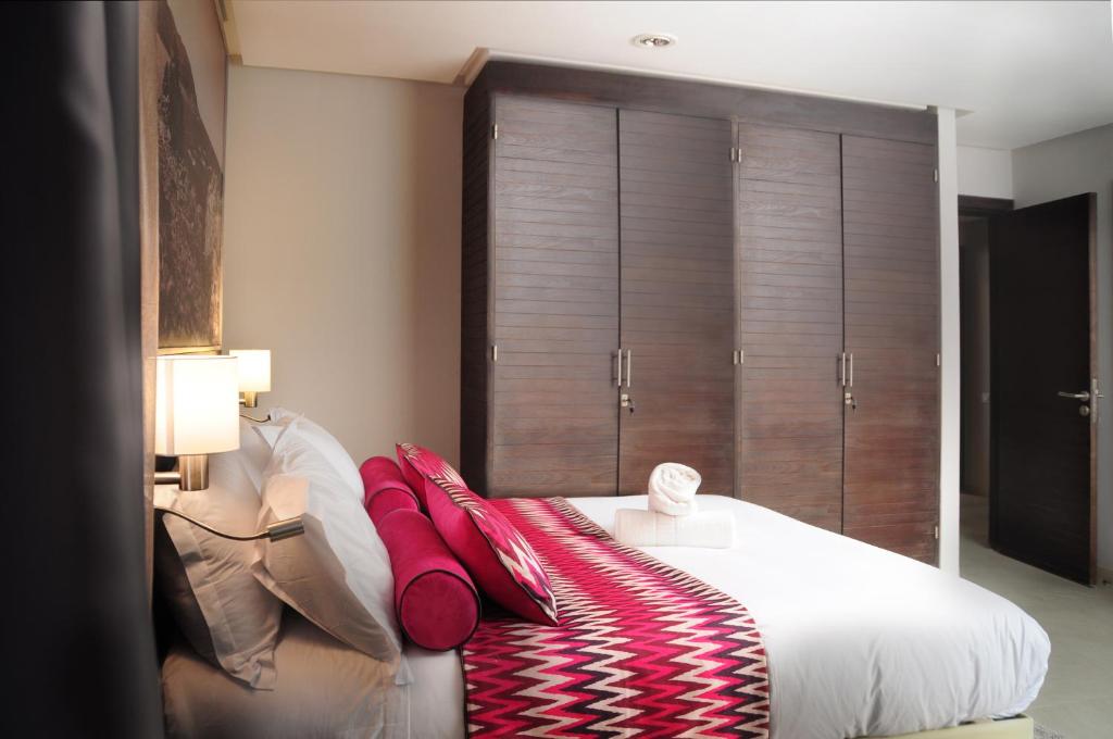 Postel nebo postele na pokoji v ubytování Appart'hotel Souani (Al Hoceima Bay)