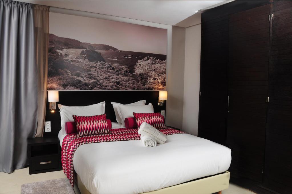Postel nebo postele na pokoji v ubytování Appart'hotel Souani (Al Hoceima Bay)
