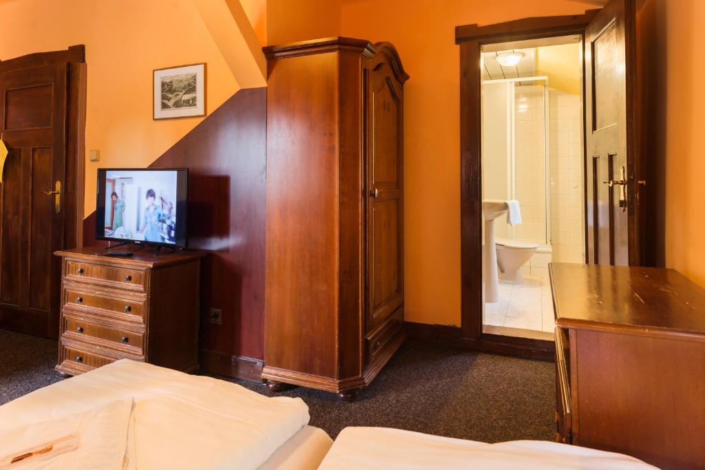Postel nebo postele na pokoji v ubytování Hotel Diana