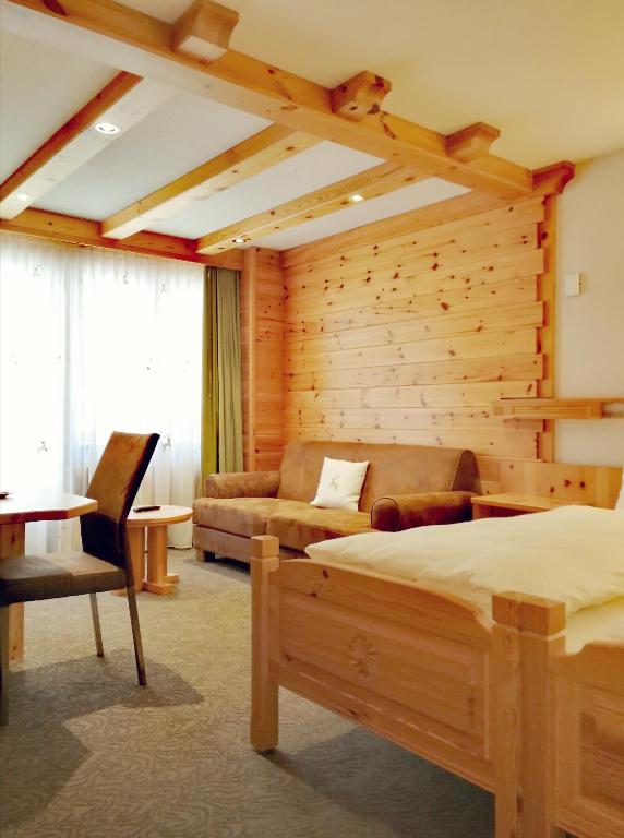 Postel nebo postele na pokoji v ubytování Ambiente Mountain Style