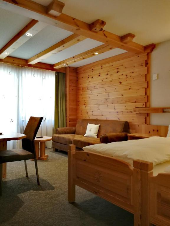 Postel nebo postele na pokoji v ubytování Ambiente Mountain Style