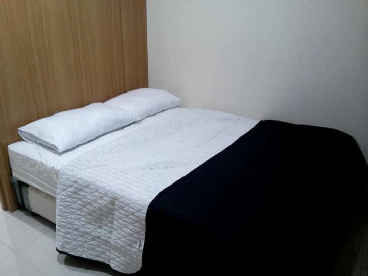Krevet ili kreveti u jedinici u okviru objekta Condo At Shell Residences