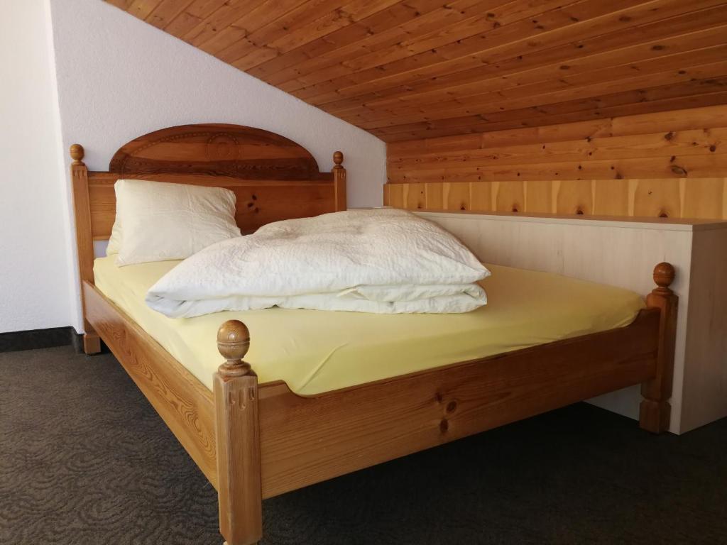 Postel nebo postele na pokoji v ubytování Ambiente Mountain Style