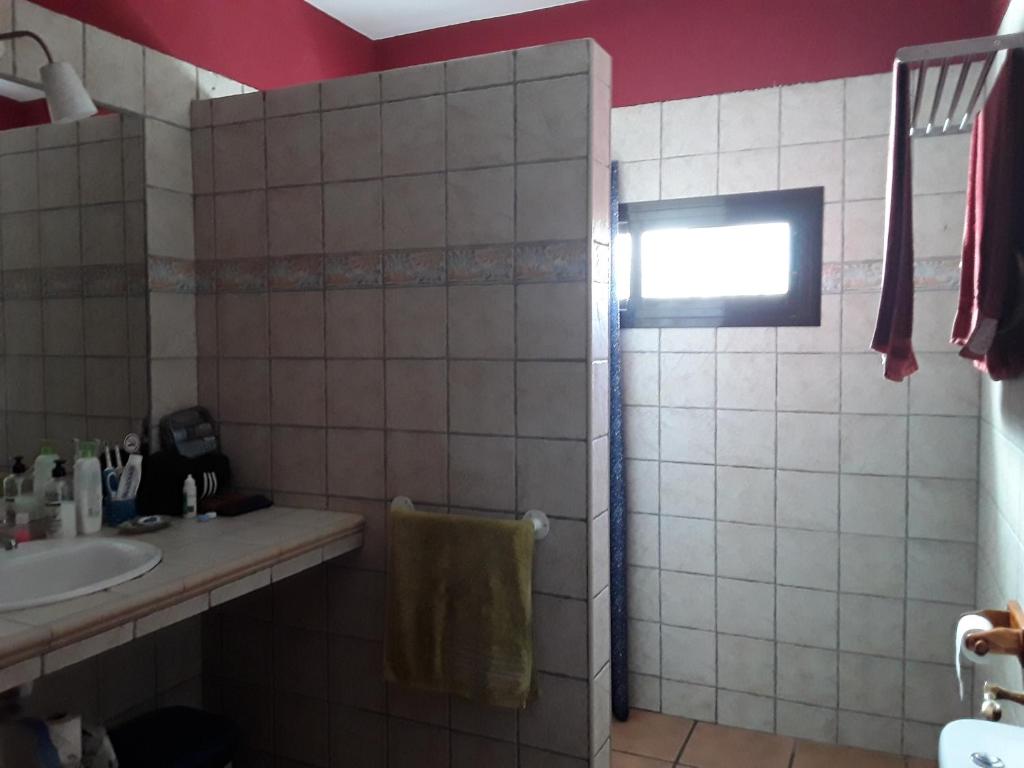 a bathroom with a shower and a sink at Blue Beach in Famara
