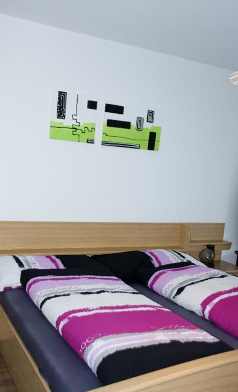Postel nebo postele na pokoji v ubytování Landgasthof Hölzlisberg