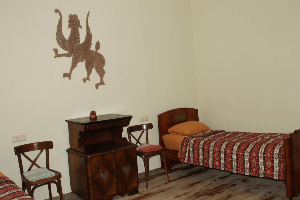 Postel nebo postele na pokoji v ubytování Master's House Dayan
