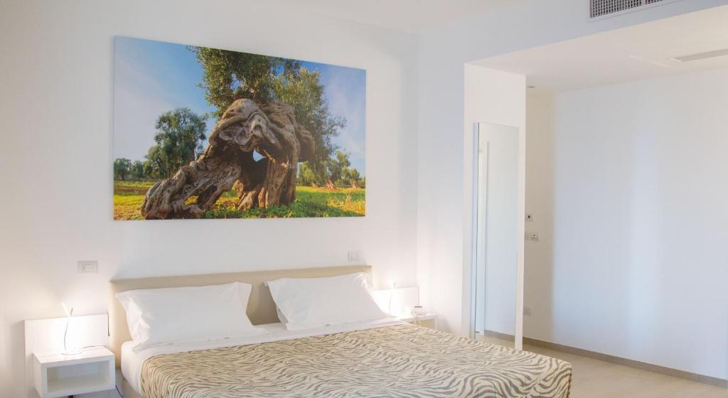 Кровать или кровати в номере Est hotel