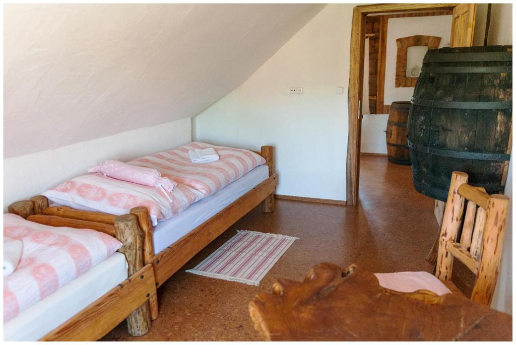 Postel nebo postele na pokoji v ubytování Osada Havranů