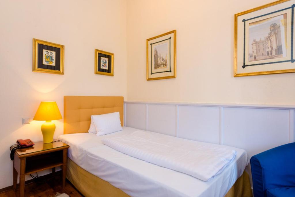Postel nebo postele na pokoji v ubytování Landhotel Groggerhof